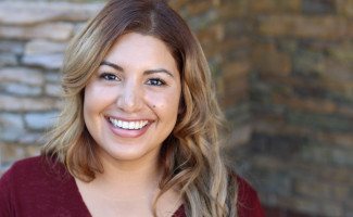 Woman with beautiful teeth smiling at camera