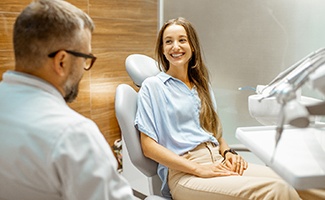 a patient during her dental consultation